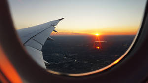 Hd Plane Window Sunset Wallpaper