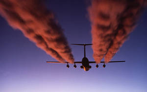 Hd Plane With Red Contrails Wallpaper
