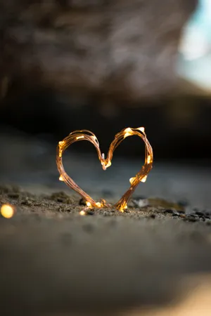 Heart Lights On Sand Wallpaper
