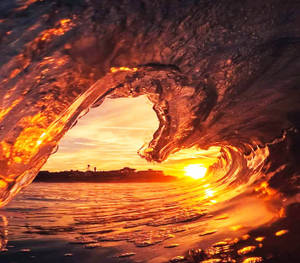 Heart-shaped Waves Sunset Desktop Wallpaper