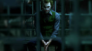 Heath Ledger Joker Behind Bars Wallpaper