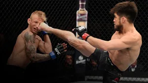 Henry Cejudo Versus Tj Dillashaw Ufc Fight Night 2019 Wallpaper