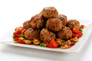 Herbed Meatballswith Tomatoes Wallpaper