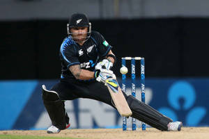 Heroic Shot Of New Zealand Cricket Icon, Brendon Mccullum Wallpaper