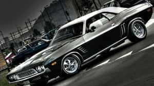 High Performance And Style – Old School Muscle Cars Wallpaper