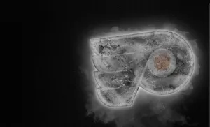 High Resolution Philadelphia Flyers Team Logo On Ice Wallpaper
