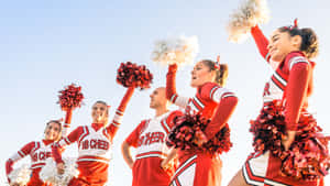High School Cheerleading Team Spirit Wallpaper