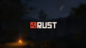 Highlighting The Rust Logo - A Glowing Campfire Theme Wallpaper