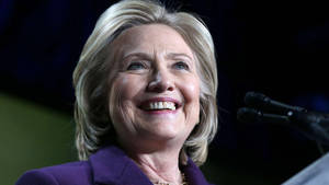 Hillary Clinton In A Cheerful Mood Wallpaper