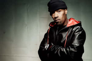 Hip Hop_ Artist_in_ Leather_ Jacket_and_ Beanie.jpg Wallpaper