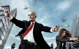 Hitman Agent 47 Holding Pistols Wallpaper