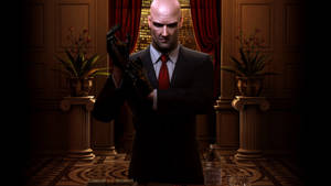 Hitman Full 4k Agent 47 Adjusting Gloves Wallpaper