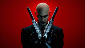 Hitman Full 4k Crossing Guns Wallpaper