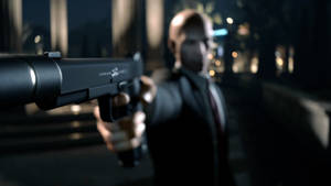 Hitman Full 4k Focus Shot Gun Wallpaper