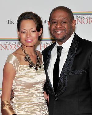 Hollywood Star Forest Whitaker Alongside Wife Keisha Nash At A Public Event. Wallpaper