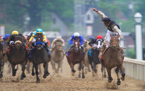 Horse Racing On A Muddy Ground Wallpaper