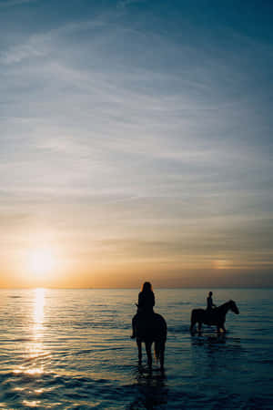 Horseback Riding Girls On Beach Wallpaper