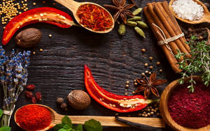 Hot Spices For Cooking On Wooden Surface Wallpaper