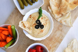 Hummus With Pita Bread And Olives Wallpaper