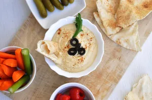 Hummus With Pita Bread And Olives Wallpaper