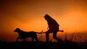 Hunting Man And Dog Wallpaper