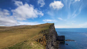 Iceland Green Lush Cliff Ocean Landscape View Wallpaper