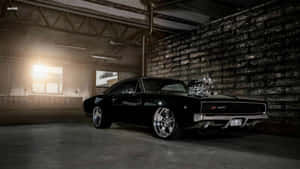 Iconic Dodge Charger Cruising On The Road Wallpaper