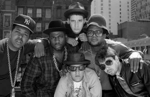 Iconic Hip-hop Legends - Beastie Boys And Run-d.m.c. In One Frame Wallpaper