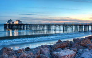 Iconic Pier On Malibu Beach Wallpaper