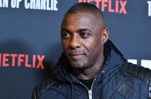 Idris Elba In Turn Up Charlie Premiere Wallpaper