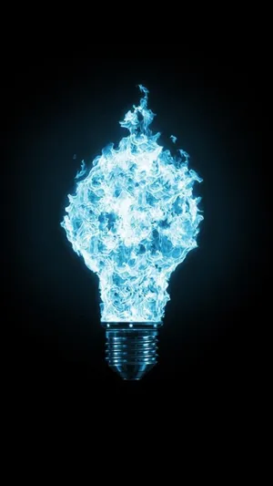 Igniting Ideas - Blue Fire Inside A Light Bulb Wallpaper