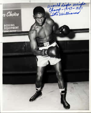 Ike Williams During A Championship Boxing Match Wallpaper