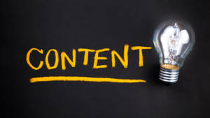 Illuminate Your Content - A Symbolic Bulb Reflecting Content Concept Wallpaper