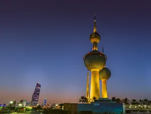 Illuminated Kuwait Towers At Night Wallpaper