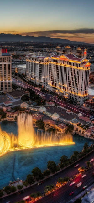 Illuminated Las Vegas Strip Viewed From An Iphone Wallpaper
