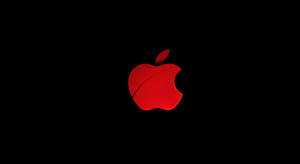 Illuminated Red Apple Logo On A Sleek Black Background Wallpaper