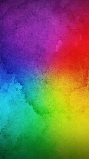 Image An Iphone X With A Vibrant Rainbow Display Wallpaper