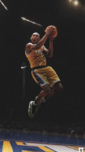 Image Legendary Los Angeles Lakers Star Kobe Bryant Playing Basketball Wallpaper