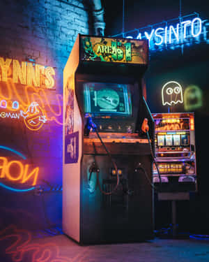 Immerse Yourself In The Vibrancy Of An Arcade Space Wallpaper