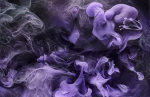 Immersed In A Lush Blue Atmosphere Of Smoke Wallpaper