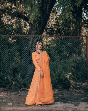 Indian Aesthetic Woman In Orange Wallpaper