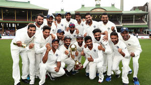 Indian Cricket Baseball Team With Trophy Wallpaper