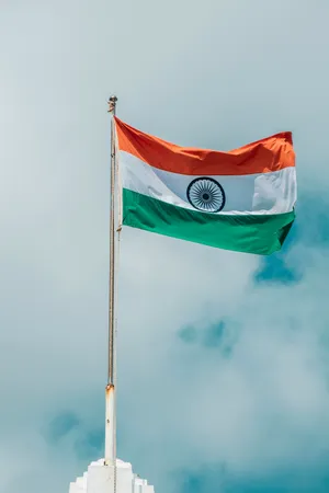 Indian Flag Hd Under White Clouds Wallpaper