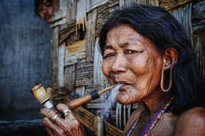 Indigenous Old Lady Smoking Wallpaper