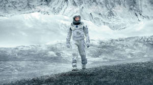 Interstellar Astronaut Cooper On Ice Wallpaper