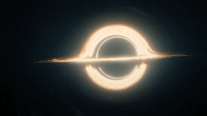 Interstellar Spinning Black Hole Wallpaper