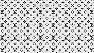 Invest In Timeless Style With Louis Vuitton Wallpaper