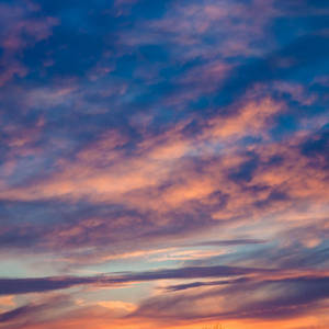 Ipad Pro Cloudy Sky During Sunset Wallpaper