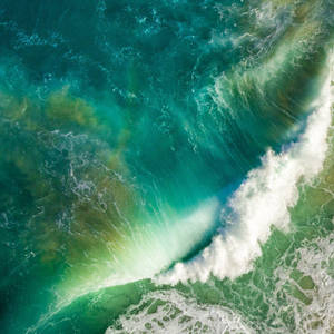 Ipad Pro Top View Of Waves Crashing Wallpaper