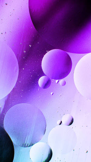 Iphone 12 Pro Purple Orbs Wallpaper
